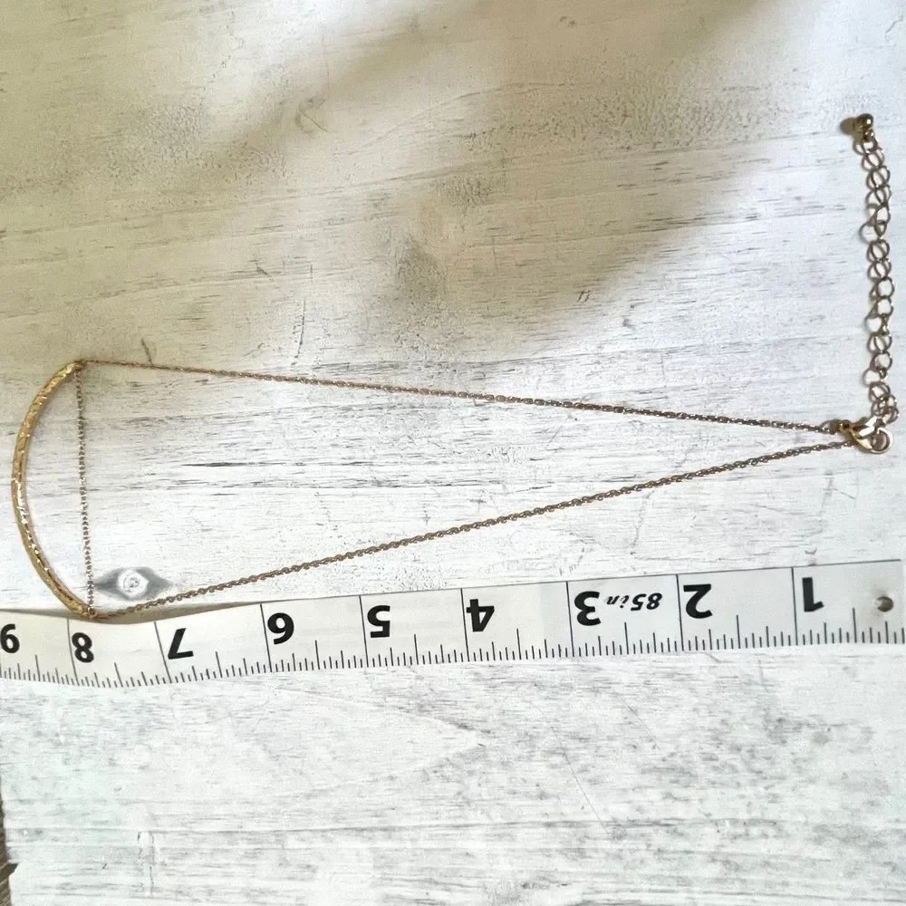 Gold tone pendant necklace
